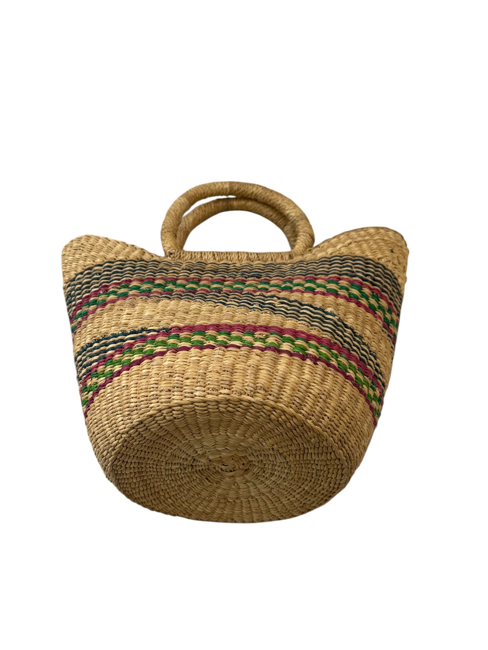 An elephant grass shopping basket laying down