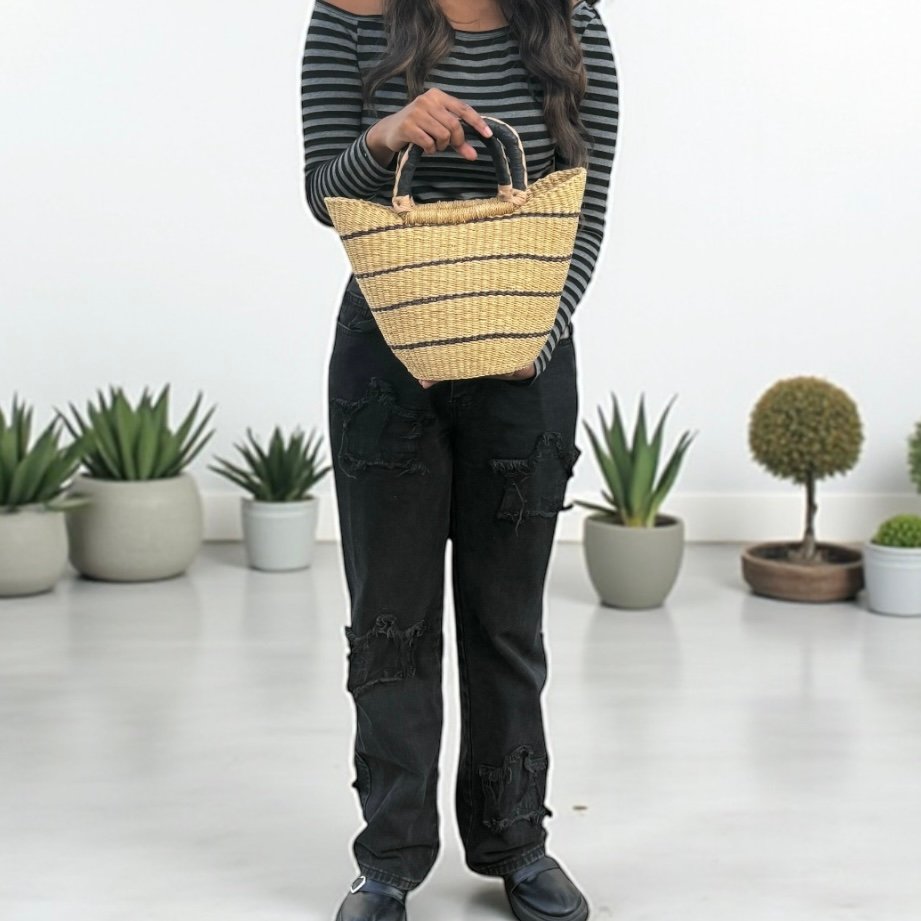 Girls showing in small basket, natural colors to the camera