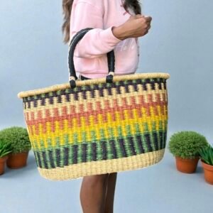 girl holding a big oval colorful basket.